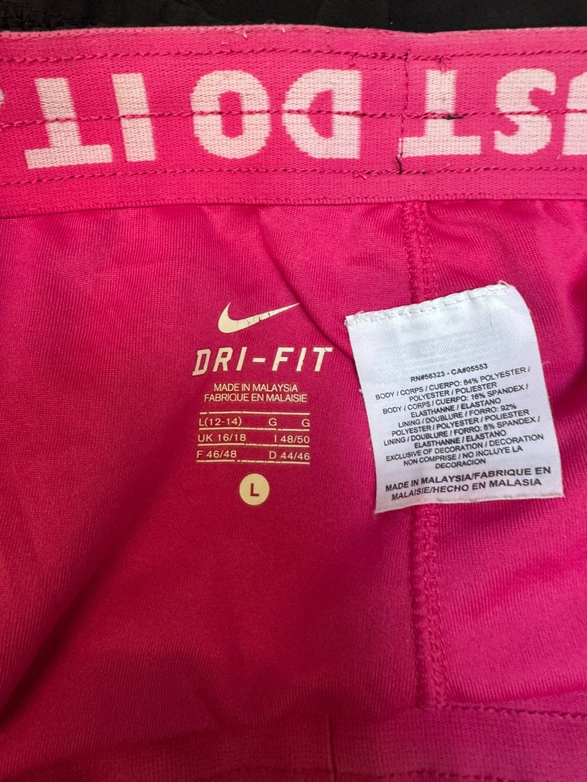 Nike Dri-FIT Athletic Running Shorts Womens Large 32" Waist Black Dolphin Hem